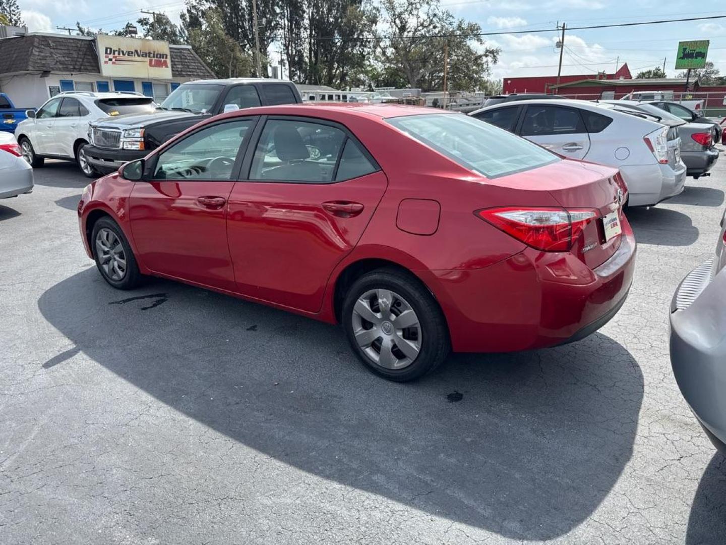 2015 RED TOYOTA COROLLA LE (2T1BURHE1FC) with an 1.8L engine, Automatic transmission, located at 2929 9th St. West, Bradenton, 34205, (941) 242-2810, 27.473591, -82.570679 - Thanks for inquring into DriveNation USA! All vehicles listed can be viewed at www.drivenationusa.com for vehicle history reports and additonal info. We cannot quote any terms such as down payments or monthly payments without an application. You can apply directly at www.drivenationusa.com or by con - Photo#5