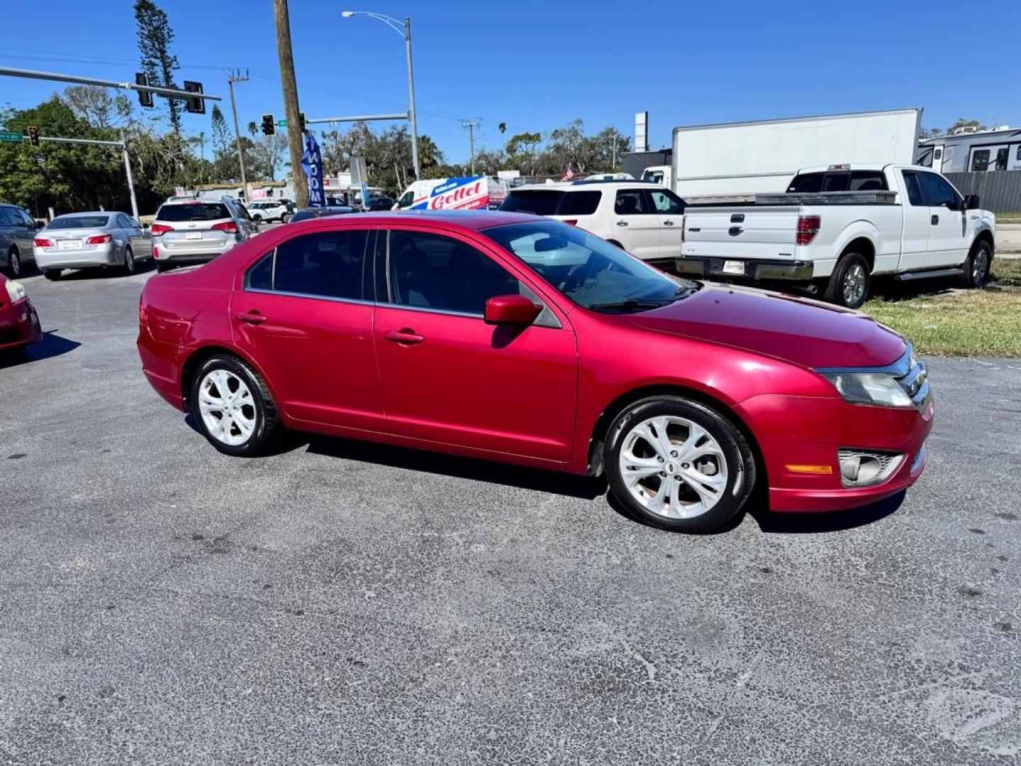 2012 RED FORD FUSION SE (3FAHP0HA6CR) with an 2.5L engine, Automatic transmission, located at 2929 9th St. West, Bradenton, 34205, (941) 242-2810, 27.473591, -82.570679 - Thanks for inquring into DriveNation USA! All vehicles listed can be viewed at www.drivenationusa.com for vehicle history reports and additonal info. We cannot quote any terms such as down payments or monthly payments without an application. You can apply directly at www.drivenationusa.com or by con - Photo#0