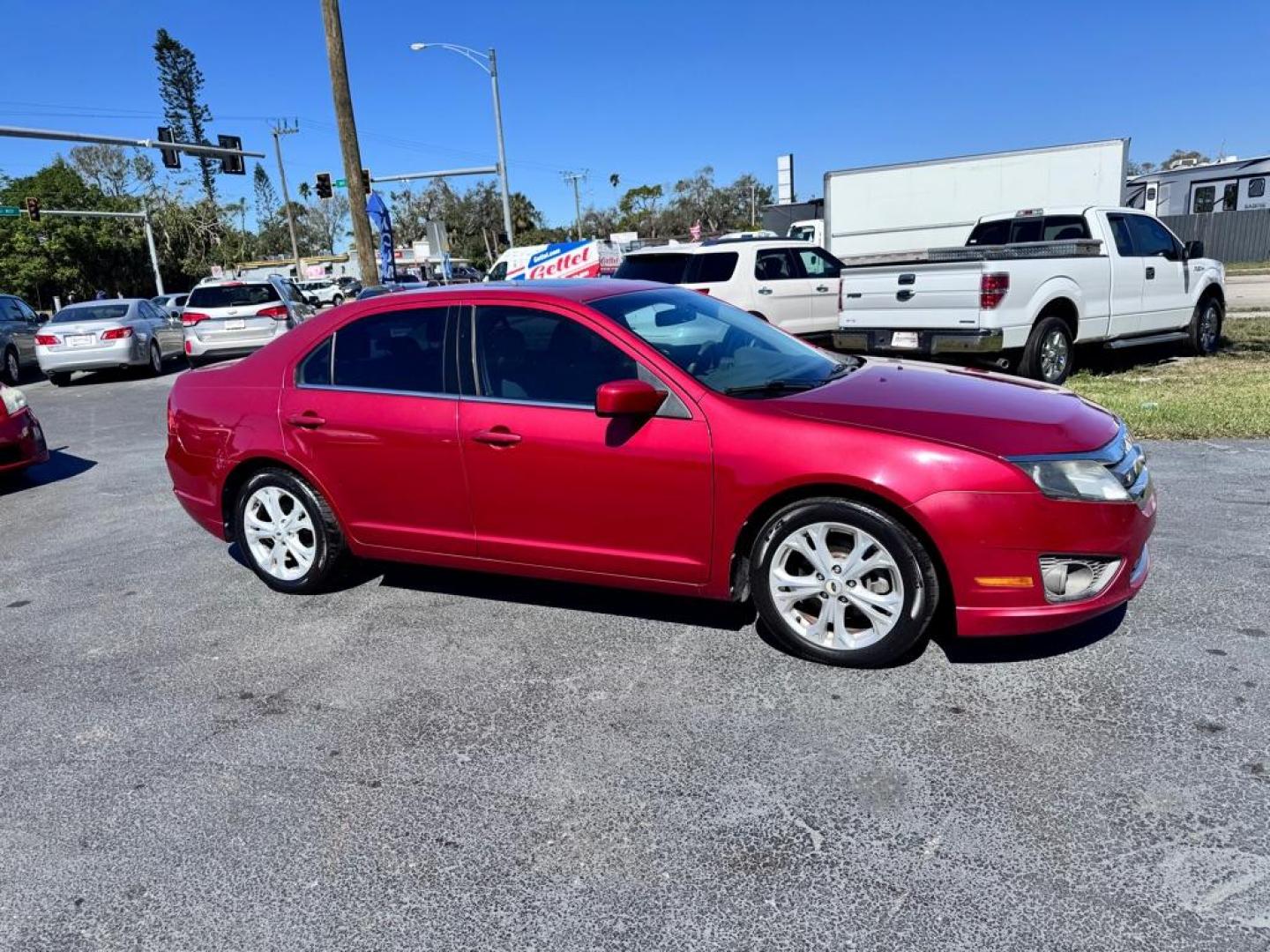 2012 RED FORD FUSION SE (3FAHP0HA6CR) with an 2.5L engine, Automatic transmission, located at 2929 9th St. West, Bradenton, 34205, (941) 242-2810, 27.473591, -82.570679 - Thanks for inquring into DriveNation USA! All vehicles listed can be viewed at www.drivenationusa.com for vehicle history reports and additonal info. We cannot quote any terms such as down payments or monthly payments without an application. You can apply directly at www.drivenationusa.com or by con - Photo#1