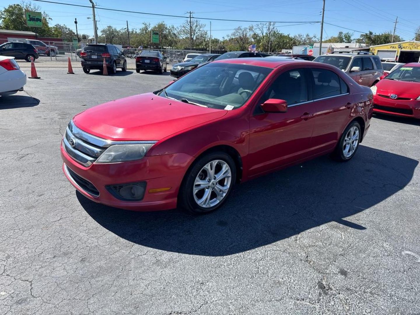 2012 RED FORD FUSION SE (3FAHP0HA6CR) with an 2.5L engine, Automatic transmission, located at 2929 9th St. West, Bradenton, 34205, (941) 242-2810, 27.473591, -82.570679 - Thanks for inquring into DriveNation USA! All vehicles listed can be viewed at www.drivenationusa.com for vehicle history reports and additonal info. We cannot quote any terms such as down payments or monthly payments without an application. You can apply directly at www.drivenationusa.com or by con - Photo#3