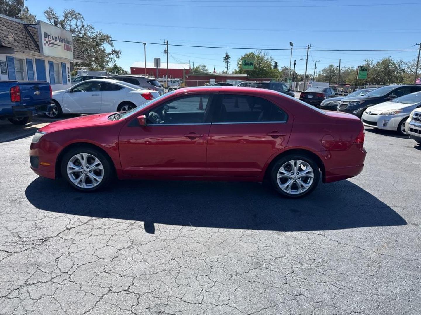 2012 RED FORD FUSION SE (3FAHP0HA6CR) with an 2.5L engine, Automatic transmission, located at 2929 9th St. West, Bradenton, 34205, (941) 242-2810, 27.473591, -82.570679 - Thanks for inquring into DriveNation USA! All vehicles listed can be viewed at www.drivenationusa.com for vehicle history reports and additonal info. We cannot quote any terms such as down payments or monthly payments without an application. You can apply directly at www.drivenationusa.com or by con - Photo#4