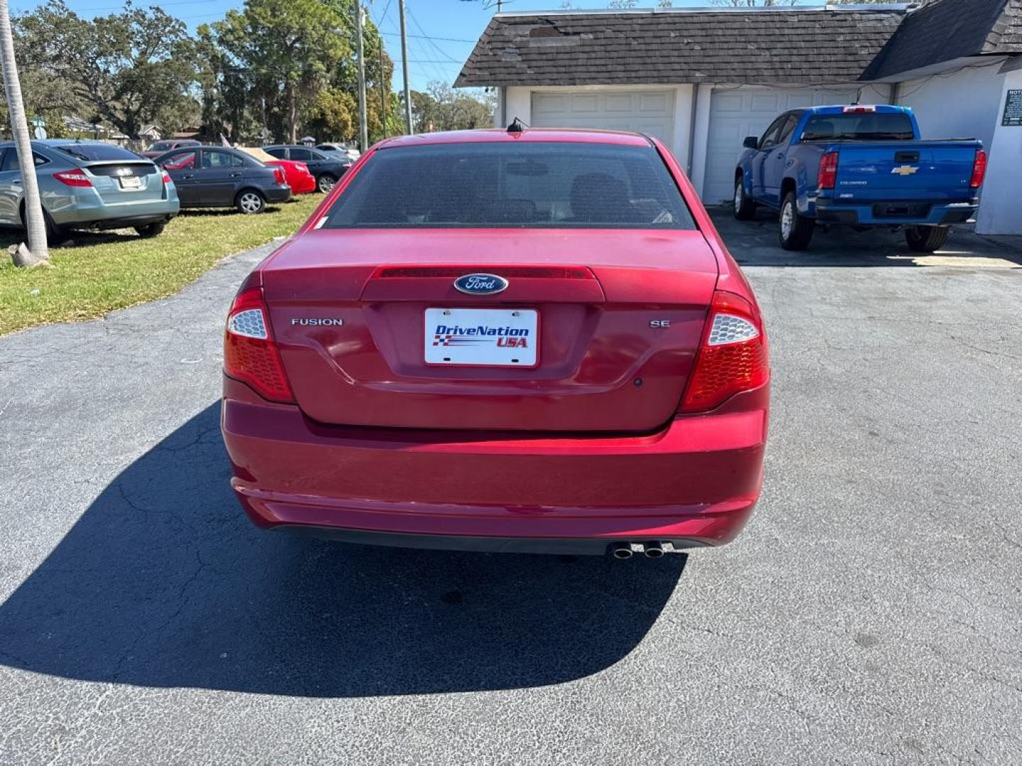 2012 RED FORD FUSION SE (3FAHP0HA6CR) with an 2.5L engine, Automatic transmission, located at 2929 9th St. West, Bradenton, 34205, (941) 242-2810, 27.473591, -82.570679 - Thanks for inquring into DriveNation USA! All vehicles listed can be viewed at www.drivenationusa.com for vehicle history reports and additonal info. We cannot quote any terms such as down payments or monthly payments without an application. You can apply directly at www.drivenationusa.com or by con - Photo#6