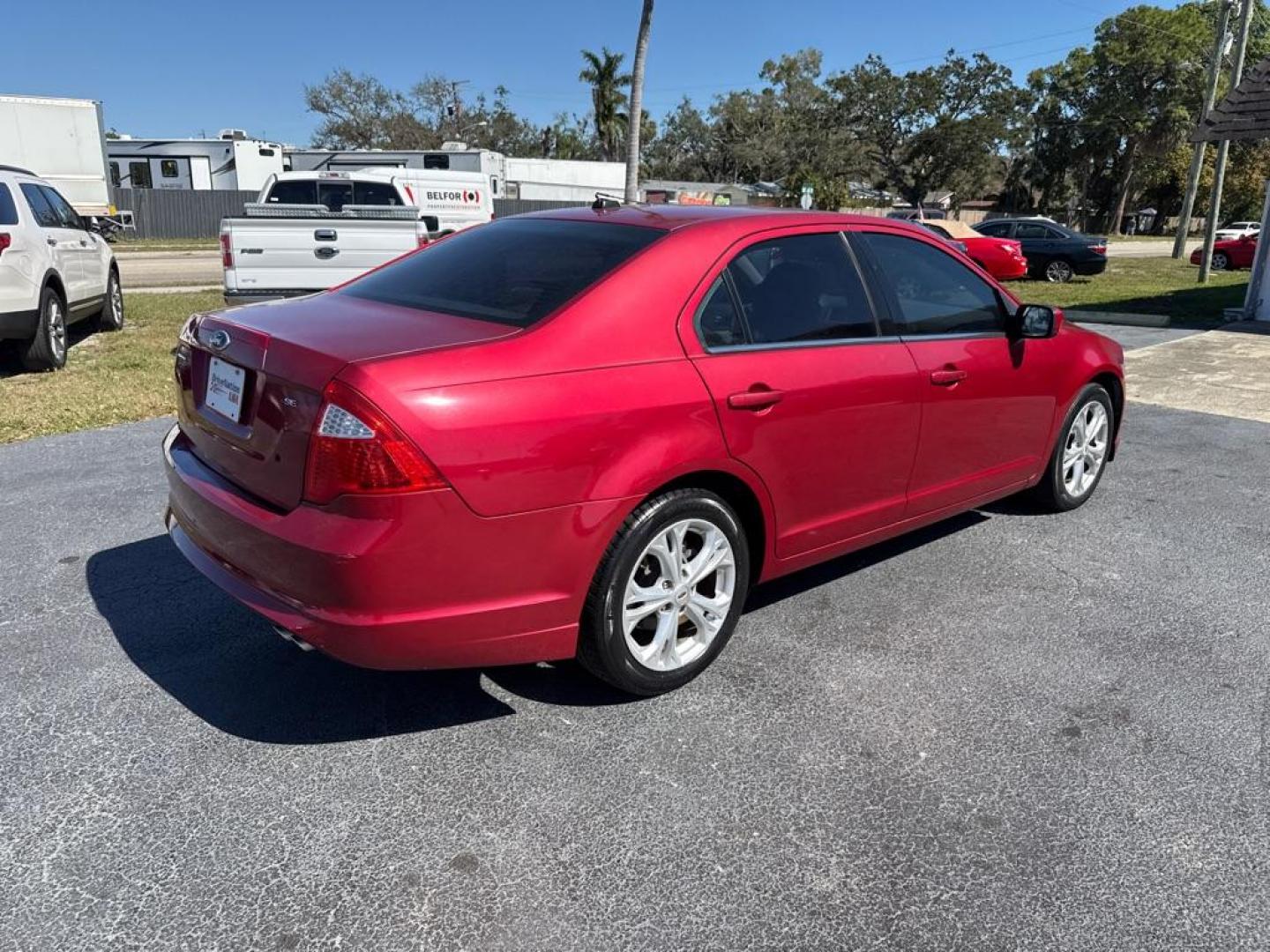 2012 RED FORD FUSION SE (3FAHP0HA6CR) with an 2.5L engine, Automatic transmission, located at 2929 9th St. West, Bradenton, 34205, (941) 242-2810, 27.473591, -82.570679 - Thanks for inquring into DriveNation USA! All vehicles listed can be viewed at www.drivenationusa.com for vehicle history reports and additonal info. We cannot quote any terms such as down payments or monthly payments without an application. You can apply directly at www.drivenationusa.com or by con - Photo#7