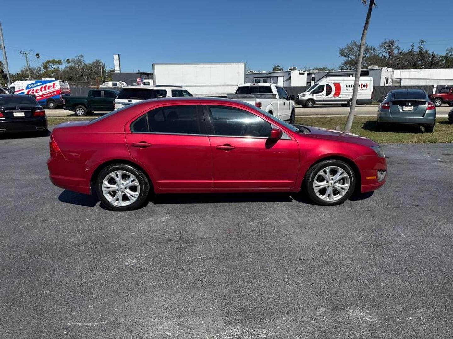 2012 RED FORD FUSION SE (3FAHP0HA6CR) with an 2.5L engine, Automatic transmission, located at 2929 9th St. West, Bradenton, 34205, (941) 242-2810, 27.473591, -82.570679 - Thanks for inquring into DriveNation USA! All vehicles listed can be viewed at www.drivenationusa.com for vehicle history reports and additonal info. We cannot quote any terms such as down payments or monthly payments without an application. You can apply directly at www.drivenationusa.com or by con - Photo#8