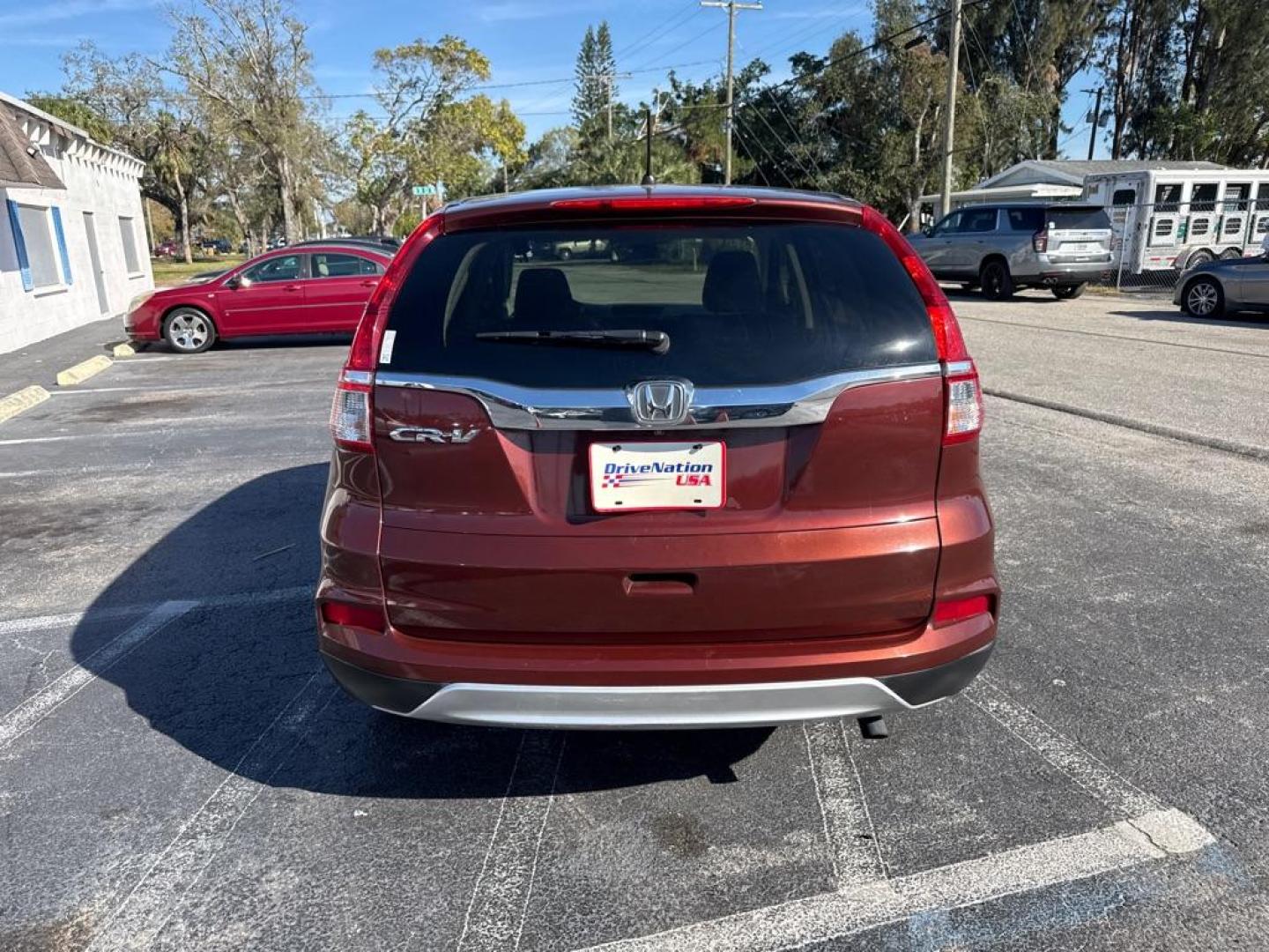 2016 MAROON HONDA CR-V EX (3CZRM3H56GG) with an 2.4L engine, Continuously Variable transmission, located at 2929 9th St. West, Bradenton, 34205, (941) 242-2810, 27.473591, -82.570679 - Thanks for inquring into DriveNation USA! All vehicles listed can be viewed at www.drivenationusa.com for vehicle history reports and additonal info. We cannot quote any terms such as down payments or monthly payments without an application. You can apply directly at www.drivenationusa.com or by con - Photo#6