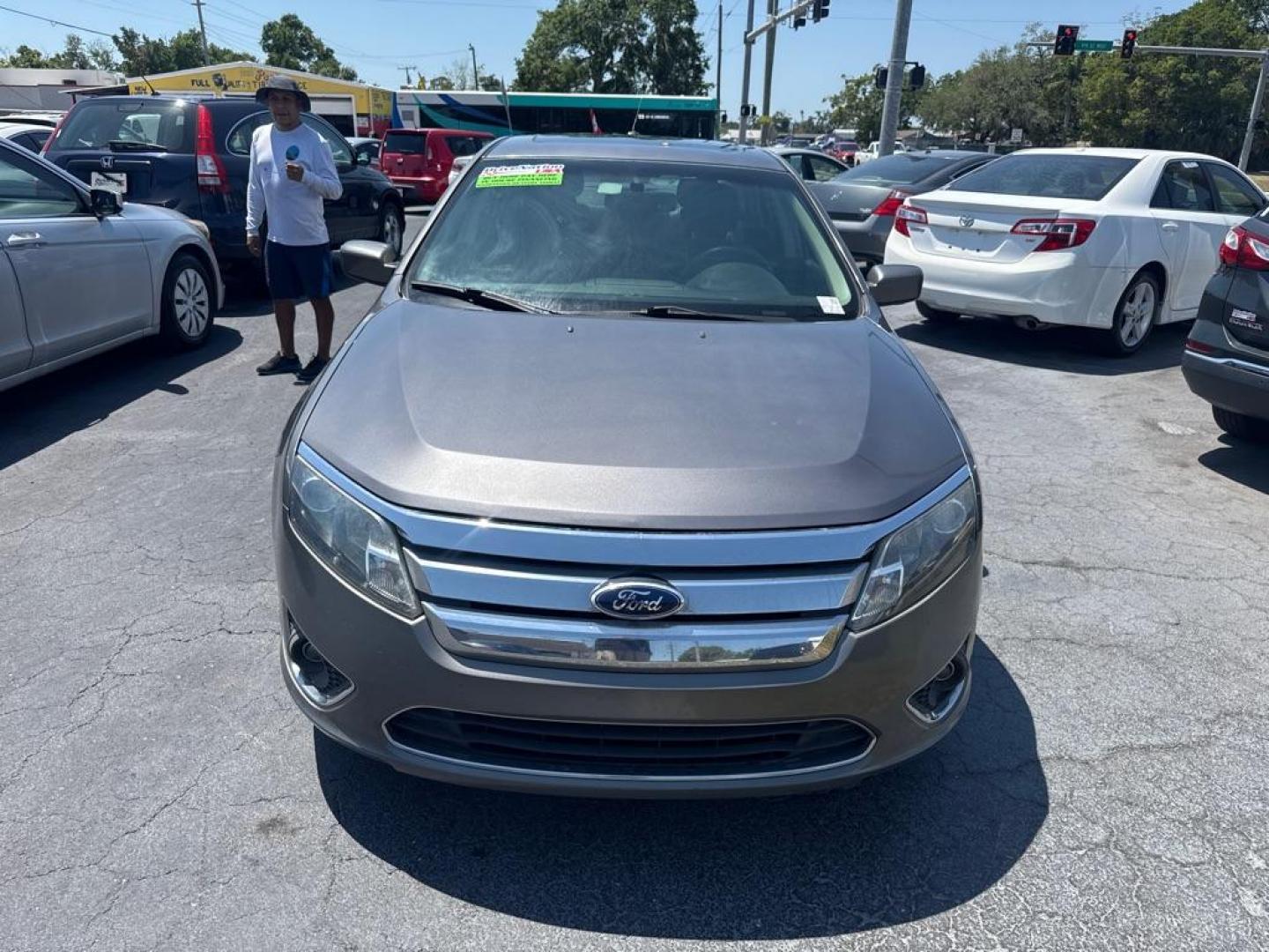 2012 GRAY FORD FUSION SE (3FAHP0HA3CR) with an 2.5L engine, Automatic transmission, located at 2929 9th St. West, Bradenton, 34205, (941) 242-2810, 27.473591, -82.570679 - Photo#1